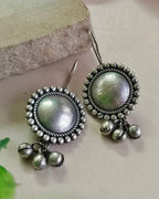Oxidised silver-look brass drop earrings with a domed centre in a beaded halo and small ghungroo bells
