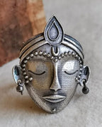 Oxidised silver-look brass adjustable statement ring featuring a crowned goddess face