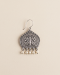 Madhuri oxidised silver-look paan leaf earring engraved with two peacocks, with cream pearl drops