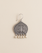 Madhuri oxidised silver-look paan leaf earring engraved with two peacocks, with cream pearl drops