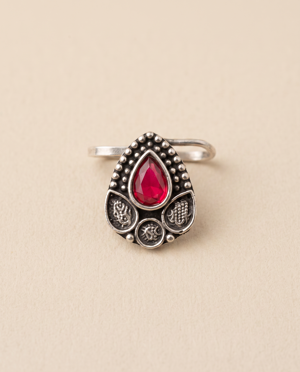 Zari oxidised silver-look beaded teardrop clip-on nose pin set with a red stone