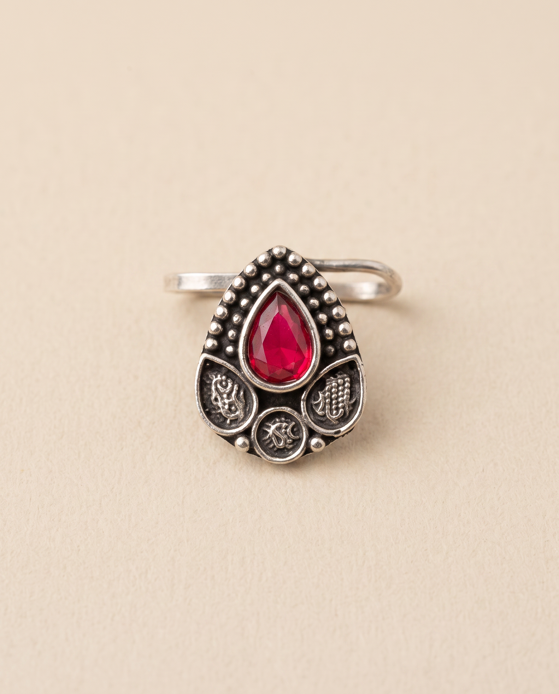 Zari oxidised silver-look beaded teardrop clip-on nose pin set with a red stone