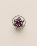 Divi oxidised silver-look floral nose pin with a deep magenta-purple centre stone and a curved wire fitting