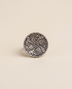 Ranchi oxidised silver-look ring with a flat round disc top engraved with a floral and scroll pattern