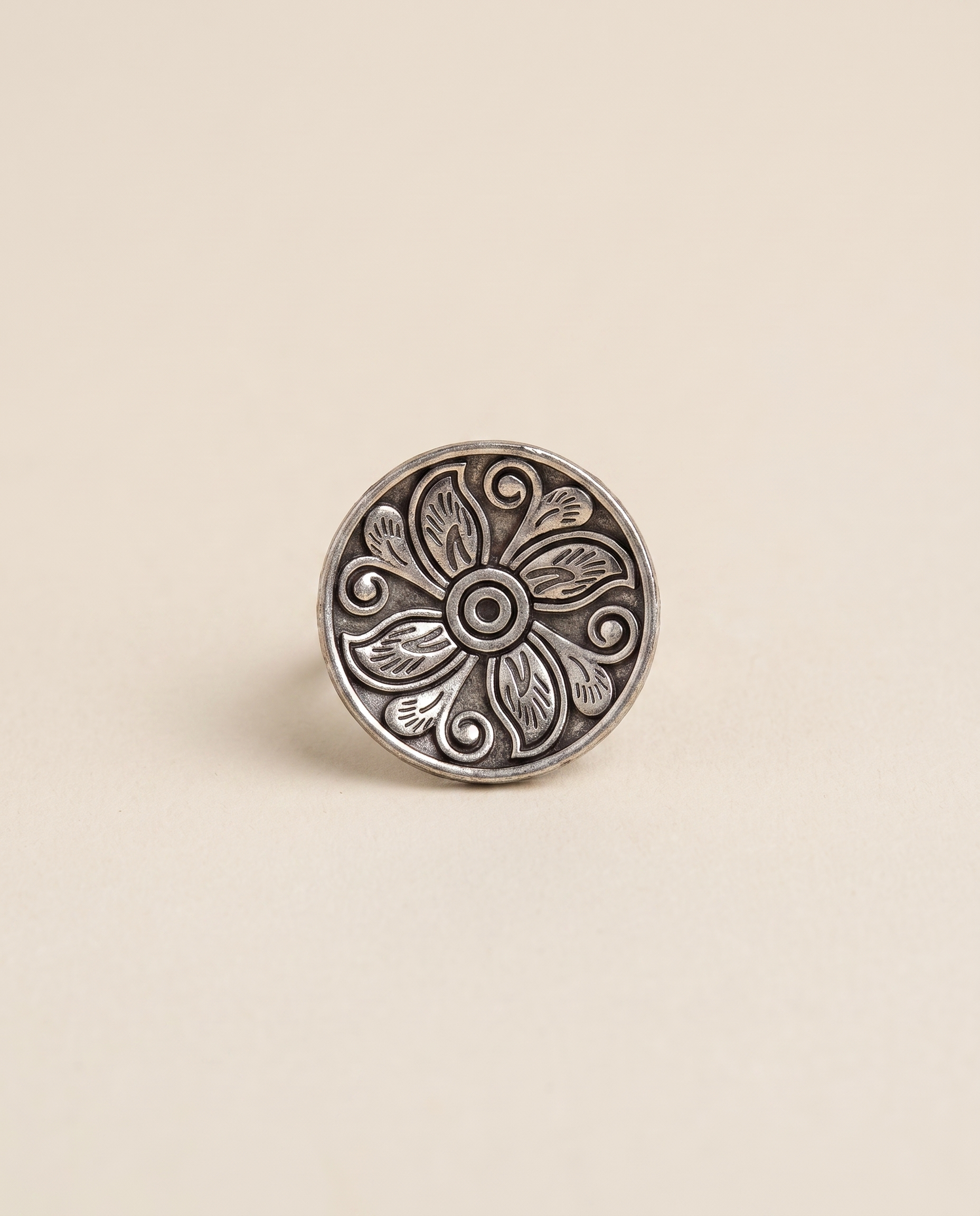 Ranchi oxidised silver-look ring with a flat round disc top engraved with a floral and scroll pattern