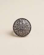 Vipra oxidised silver-look ring with a domed top covered in swirling paisley engraving