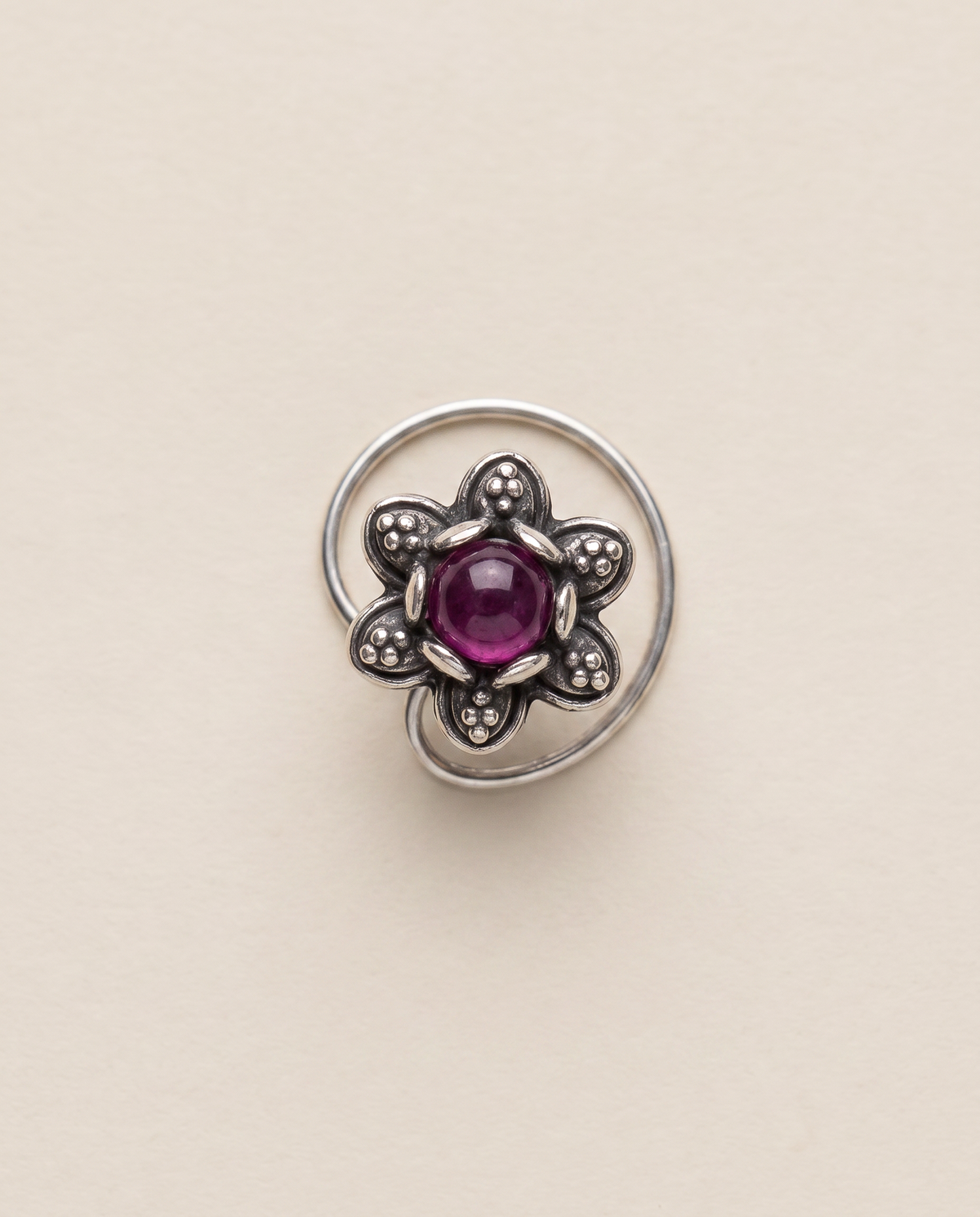 Urban Tevar Divi floral nose pin on light background