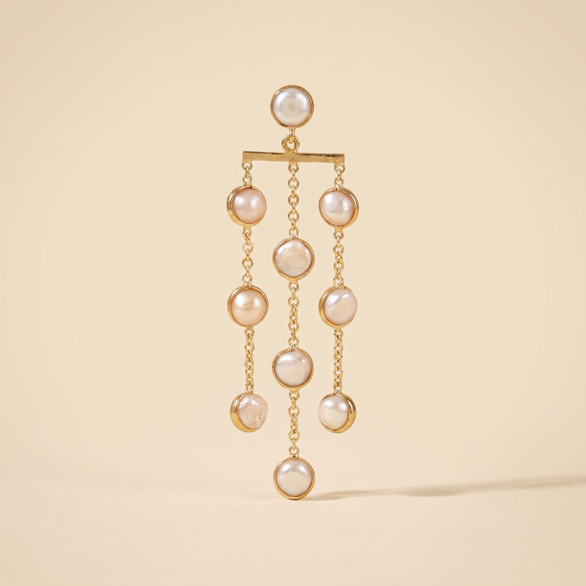 Freshwater pearl waterfall drop earrings on a light background