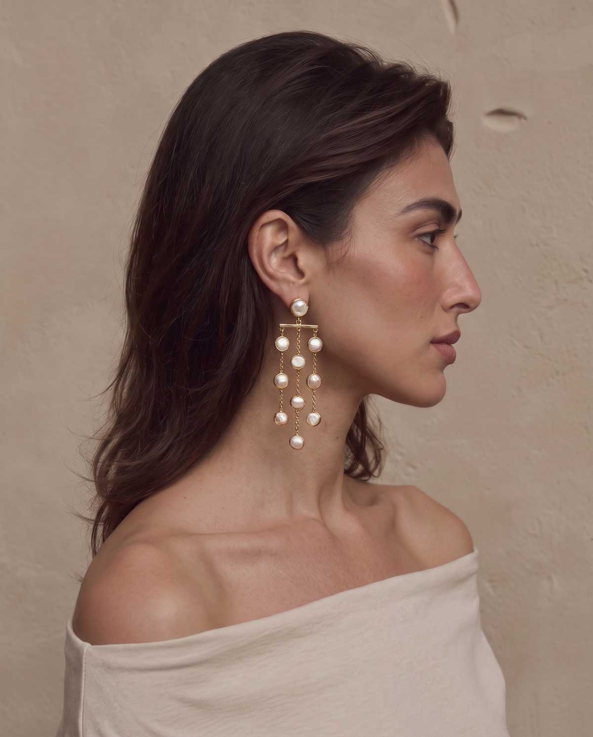 Freshwater pearl waterfall drop earrings worn on a model