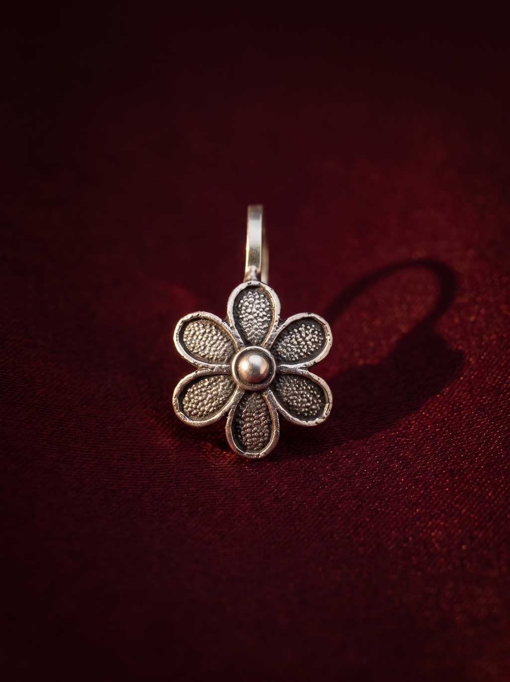 Urban Tevar Lily floral clip-on nose pin, oxblood backdrop