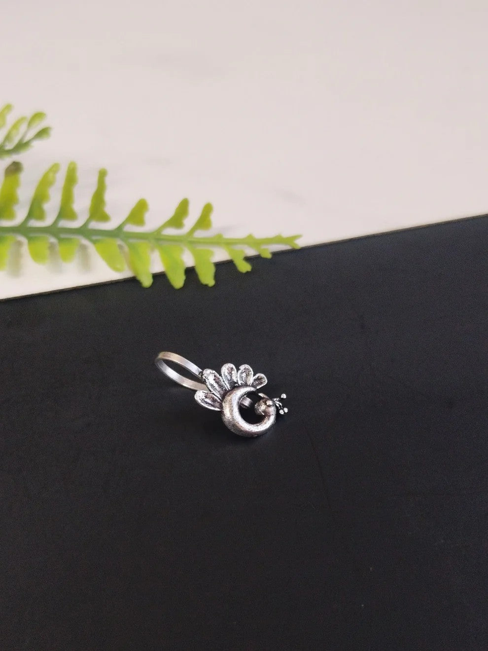 Urban Tevar Morni peacock clip-on nose pin detail