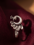 Urban Tevar Morni peacock oxidised silver clip-on nose pin, oxblood backdrop