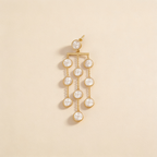 Pearl waterfall drop earrings on a light background