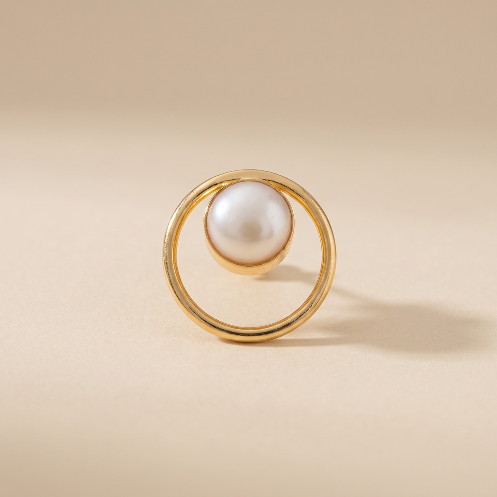 Round frame pearl stud earrings on a light background