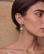 Sattu oxidised silver-look earrings worn on a model