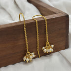 Sui dhaga pearl thread-through earrings, detail view