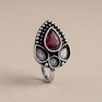 Urban Tevar Zari teardrop nose pin with red stone on light background